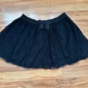 Black lace skirt with bow patterns from Forever